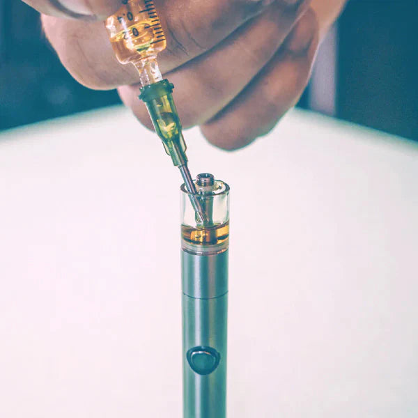 Filling cartridge by syringe