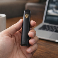 and holding Astro black vape hardware
