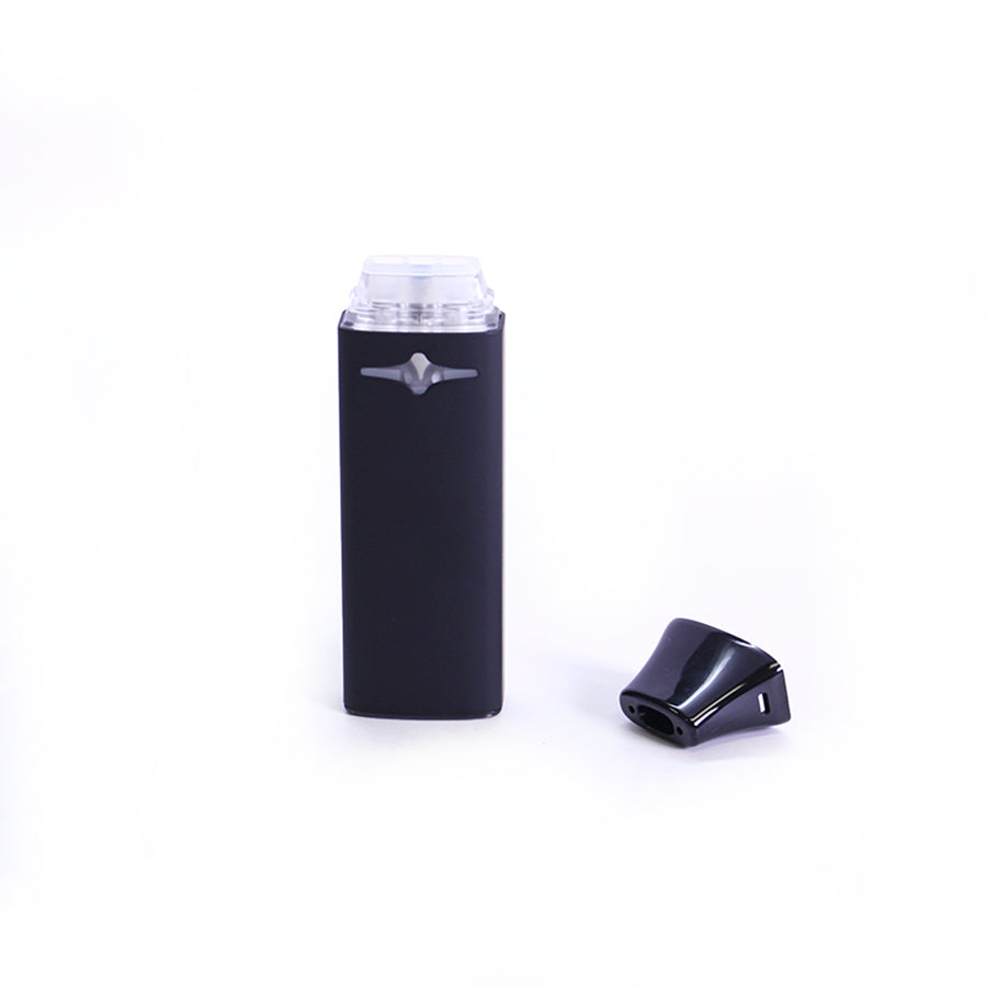 Black black disposable vape on a white background with the mouthpiece disassembled