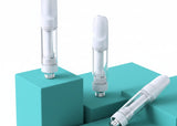 Three white vape devices on turquoise geometric shapes against a white background