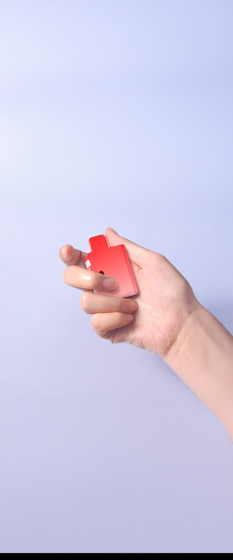 Hand holding a red vape against a light purple background